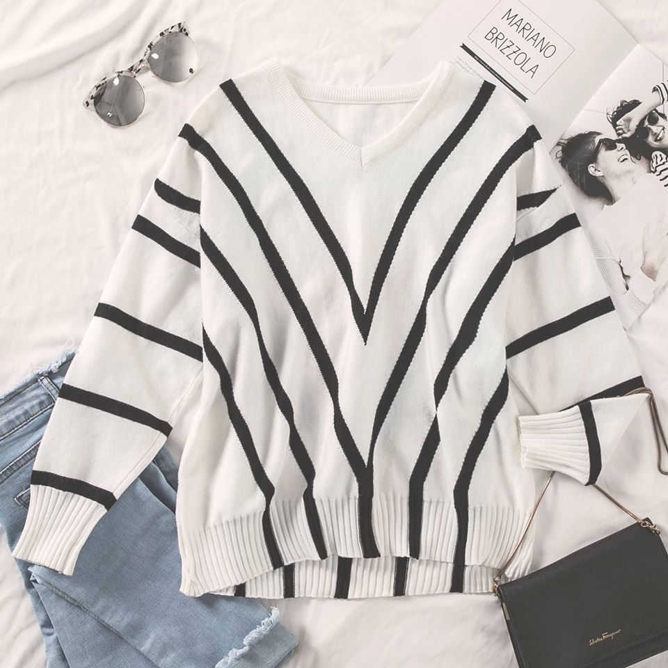 white sweater